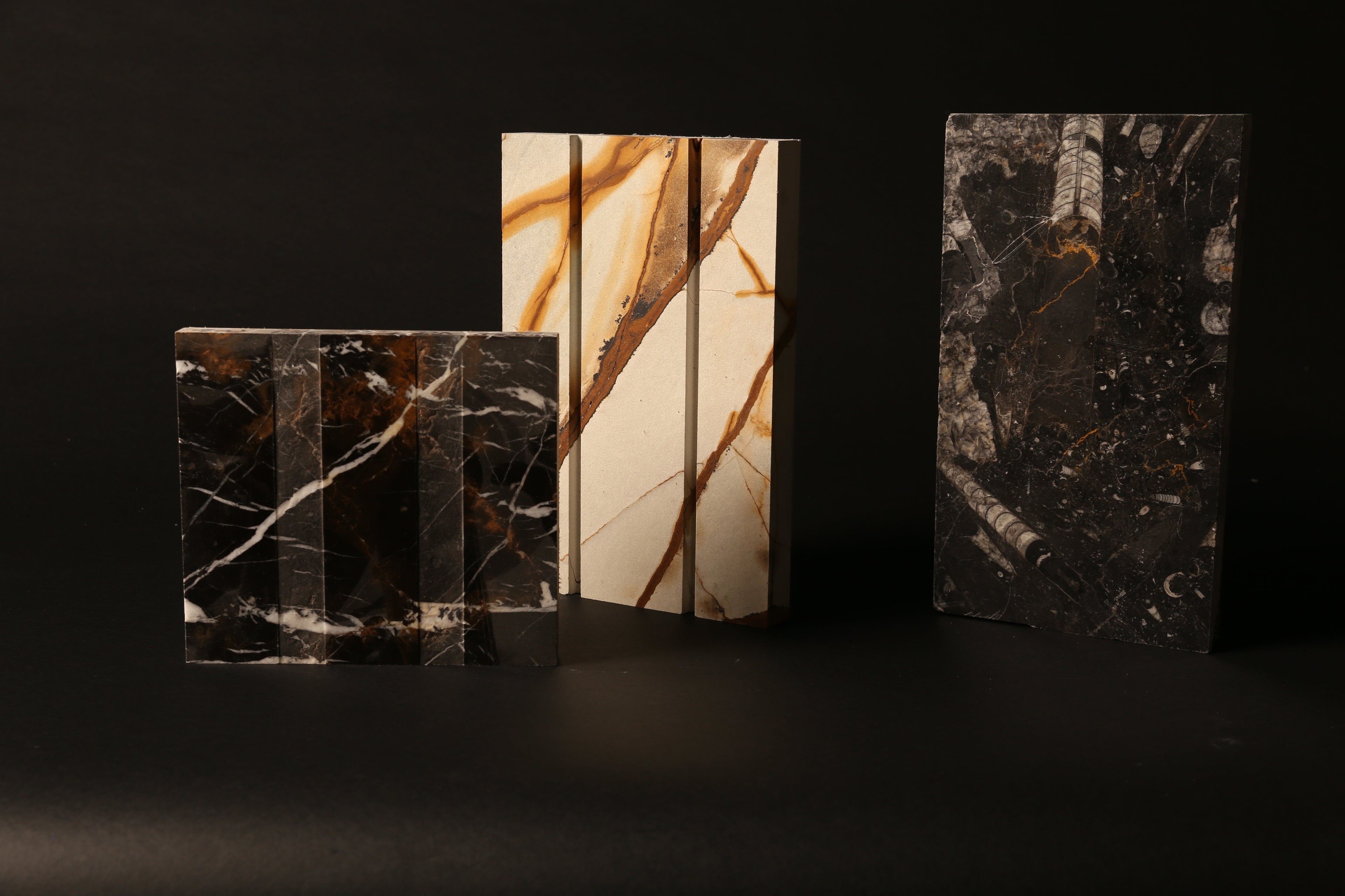 A set of three contemporary marble sculptures