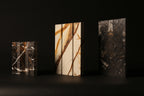 A set of three contemporary marble sculptures
