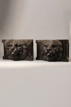 Pair of Belgian marble lion faces